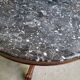 Round pedestal table with marble top and mahogany tripod from the 19th century