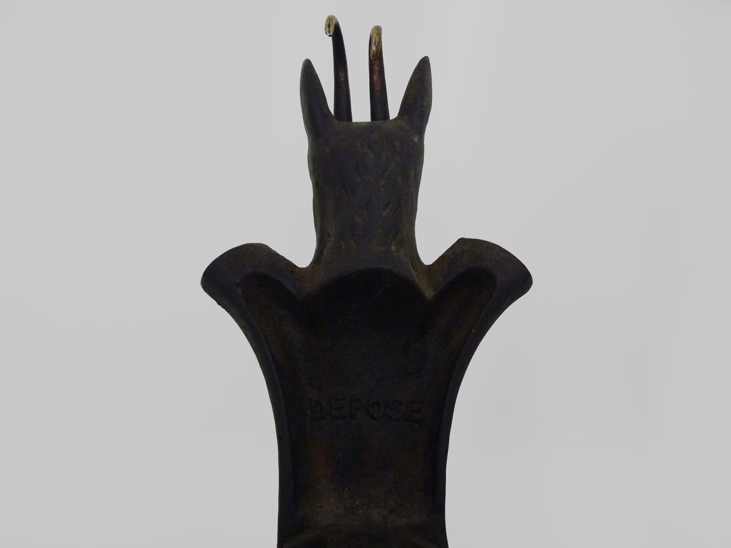 Pair of zoomorphic cast iron chimney pegs representing Isards. 50s