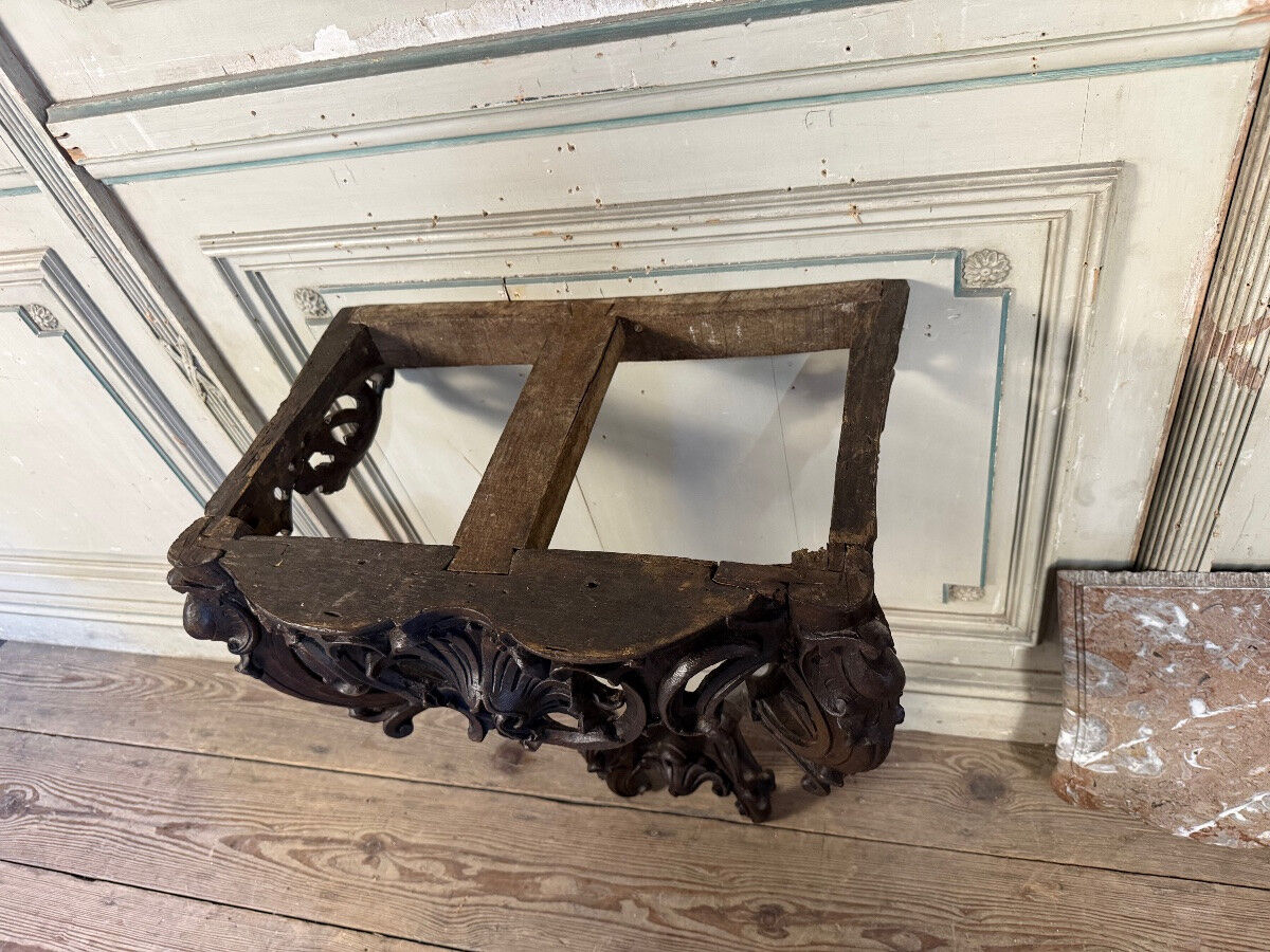 Console Louis XV en chêne sculpté, patine noire, XVIIIeme siècle