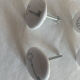 white ceramic door knobs with illustration