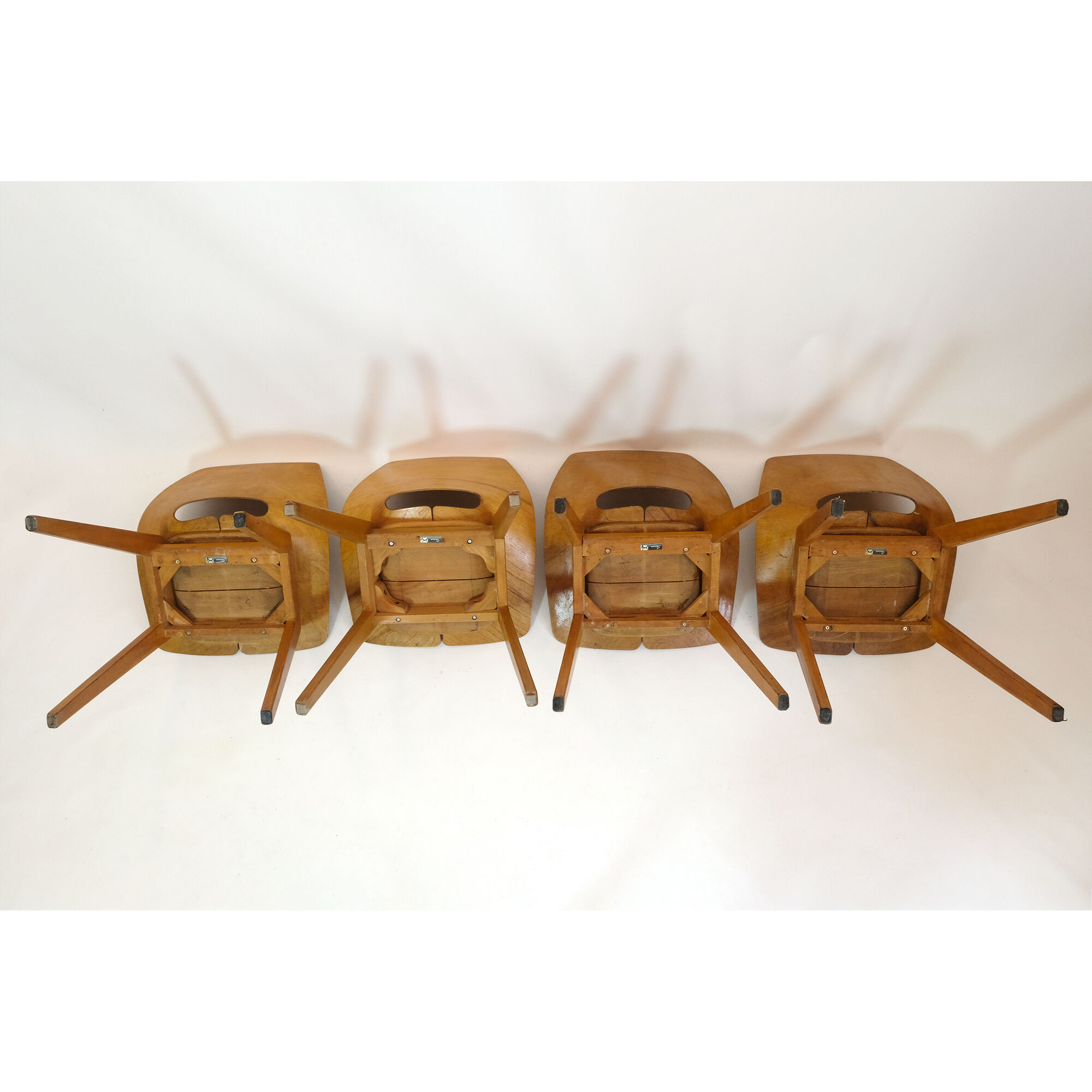Set of 4 barrel chairs, wooden base, Pierre Guariche, Steiner, 1950s.