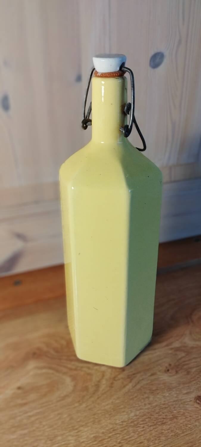 Glazed yellow stoneware bottle, 20th century.