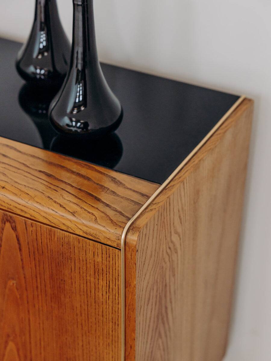 Low wooden sideboard by Bohumil Landsman and Hubert Nepozitek