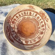 Large shallow terracotta dish decorated with birds, 20th century.
