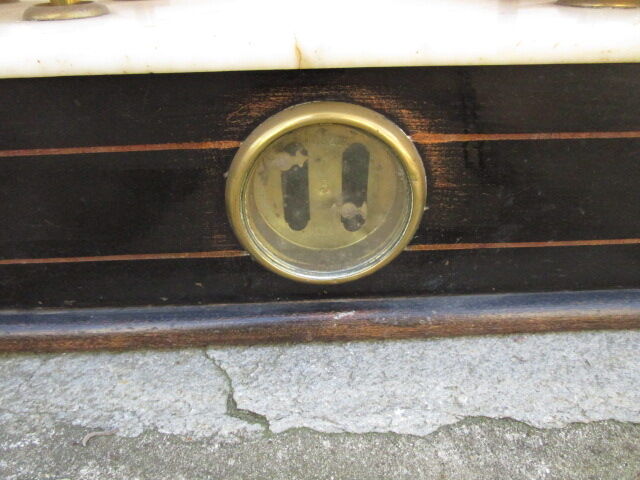 Ancient scale in marble and wood