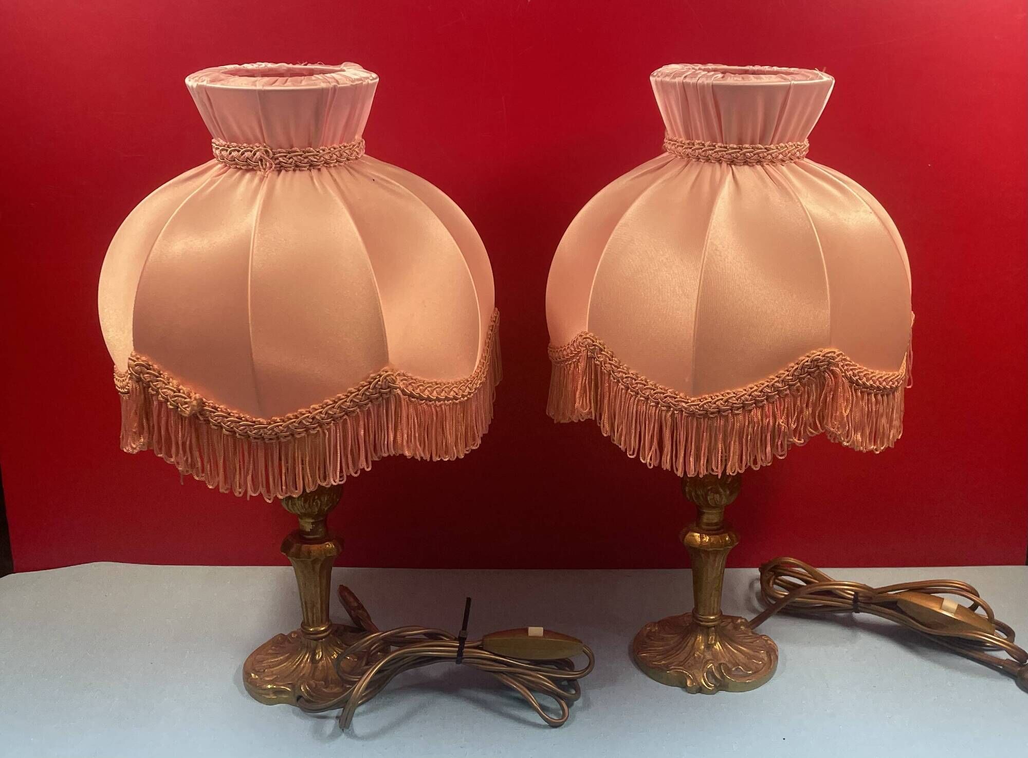 Pair of brass foot lamps, haloed but acceptable lampshades H 33 cm