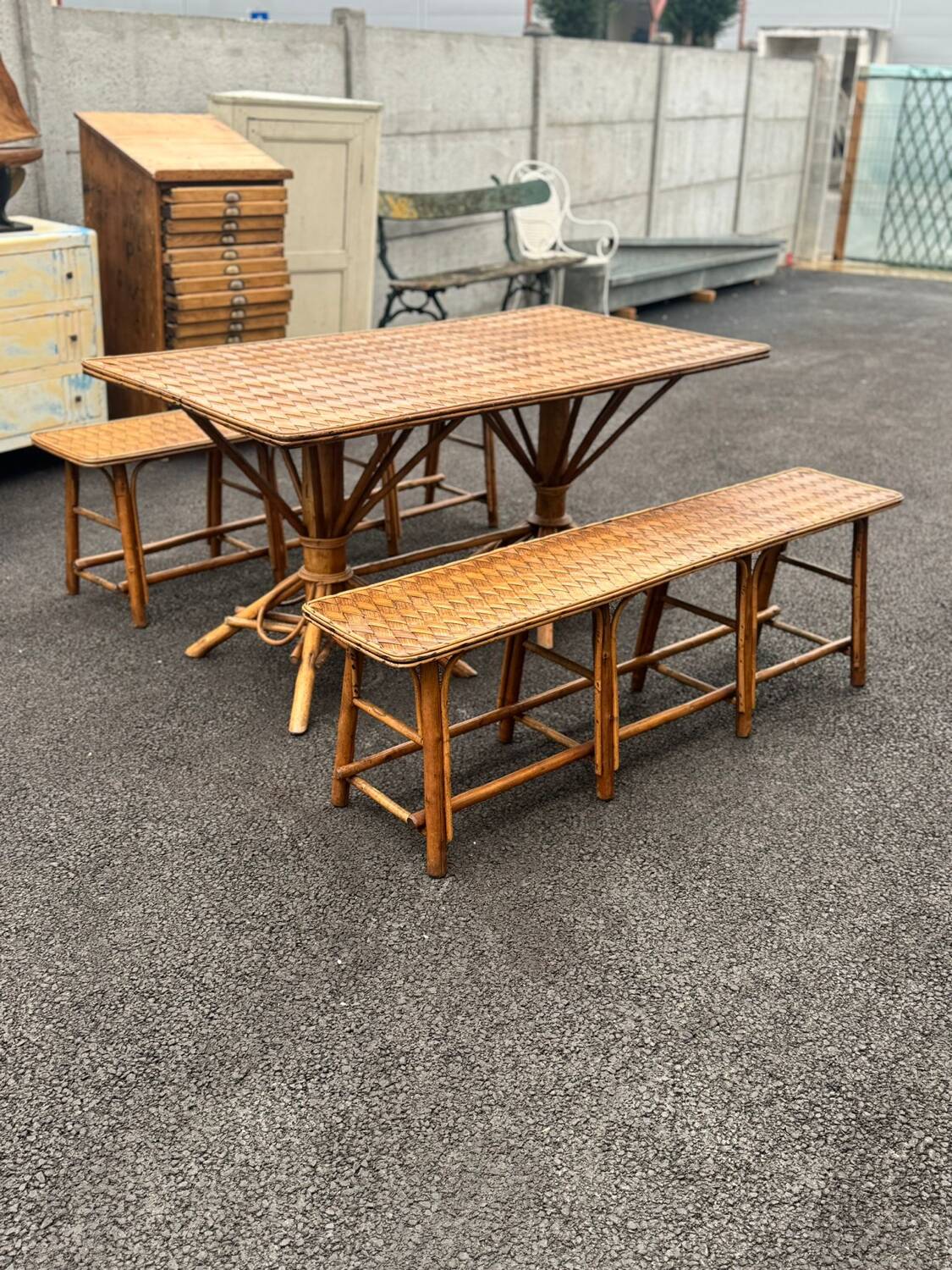 Vintage 1950s set: large table with tripod base and benches in woven chestnut