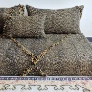 Moroccan sofa on the floor – black and gold pattern