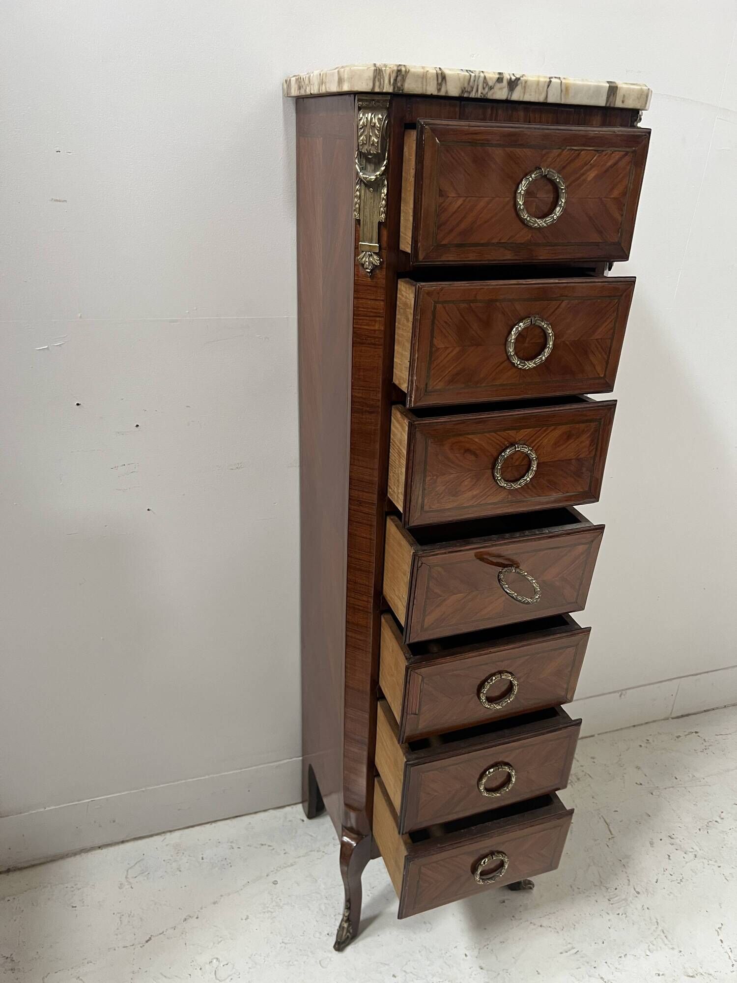 Semainier de style Transition en placage de bois, XXème siècle