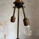 Scandinavian tripod reading lamp in teak and brass.