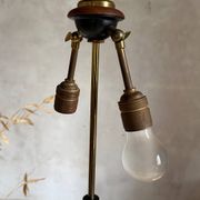 Scandinavian tripod reading lamp in teak and brass.