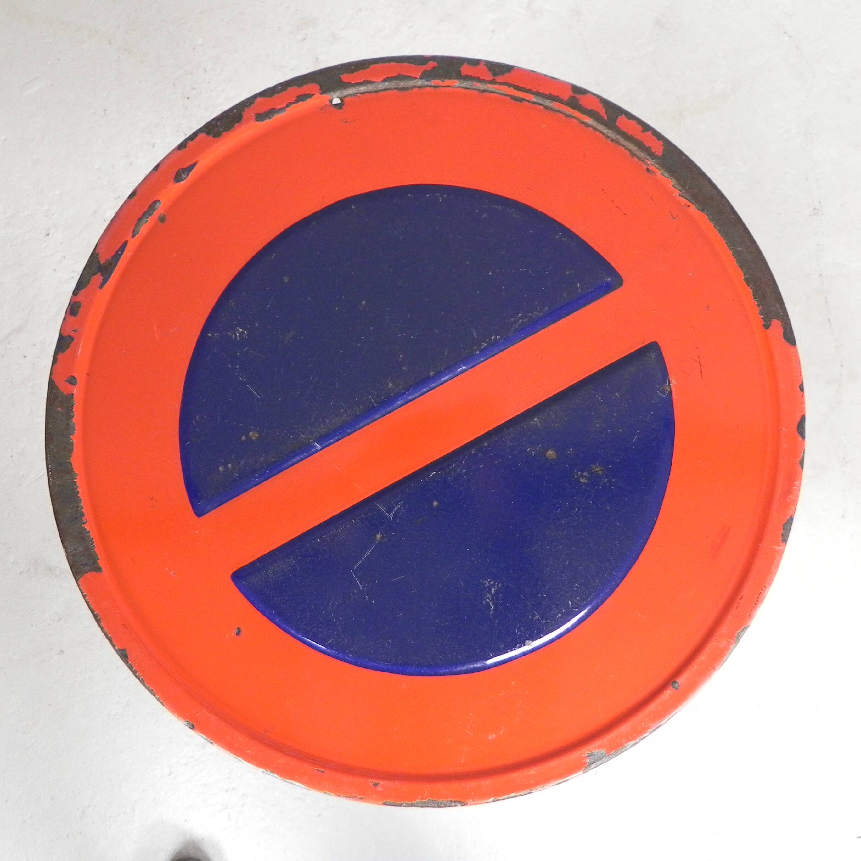 Bistro table with a cast iron base and a traffic sign as a tabletop, Paris 1920s.