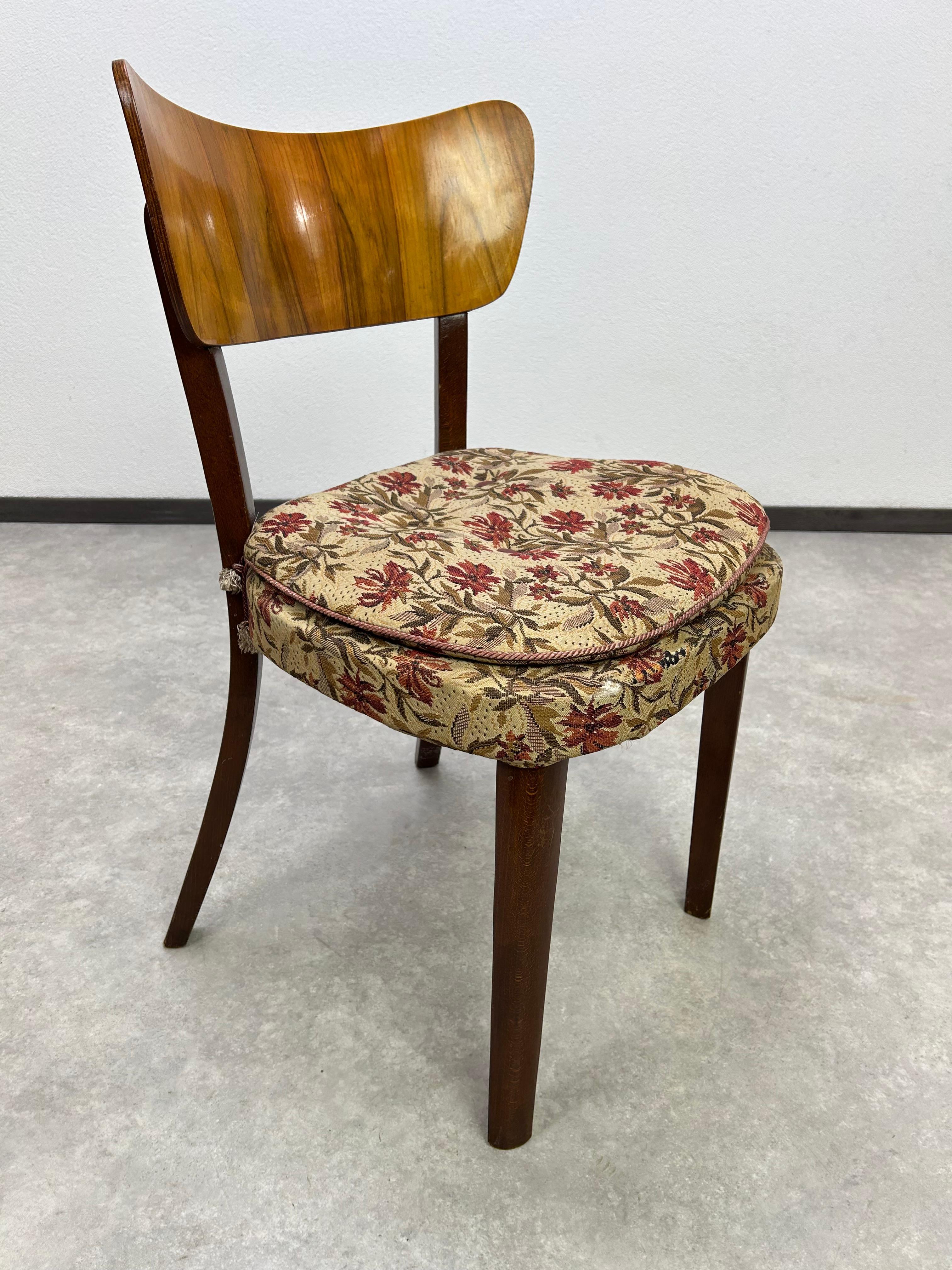 Set of 4 dining chairs by Tatra