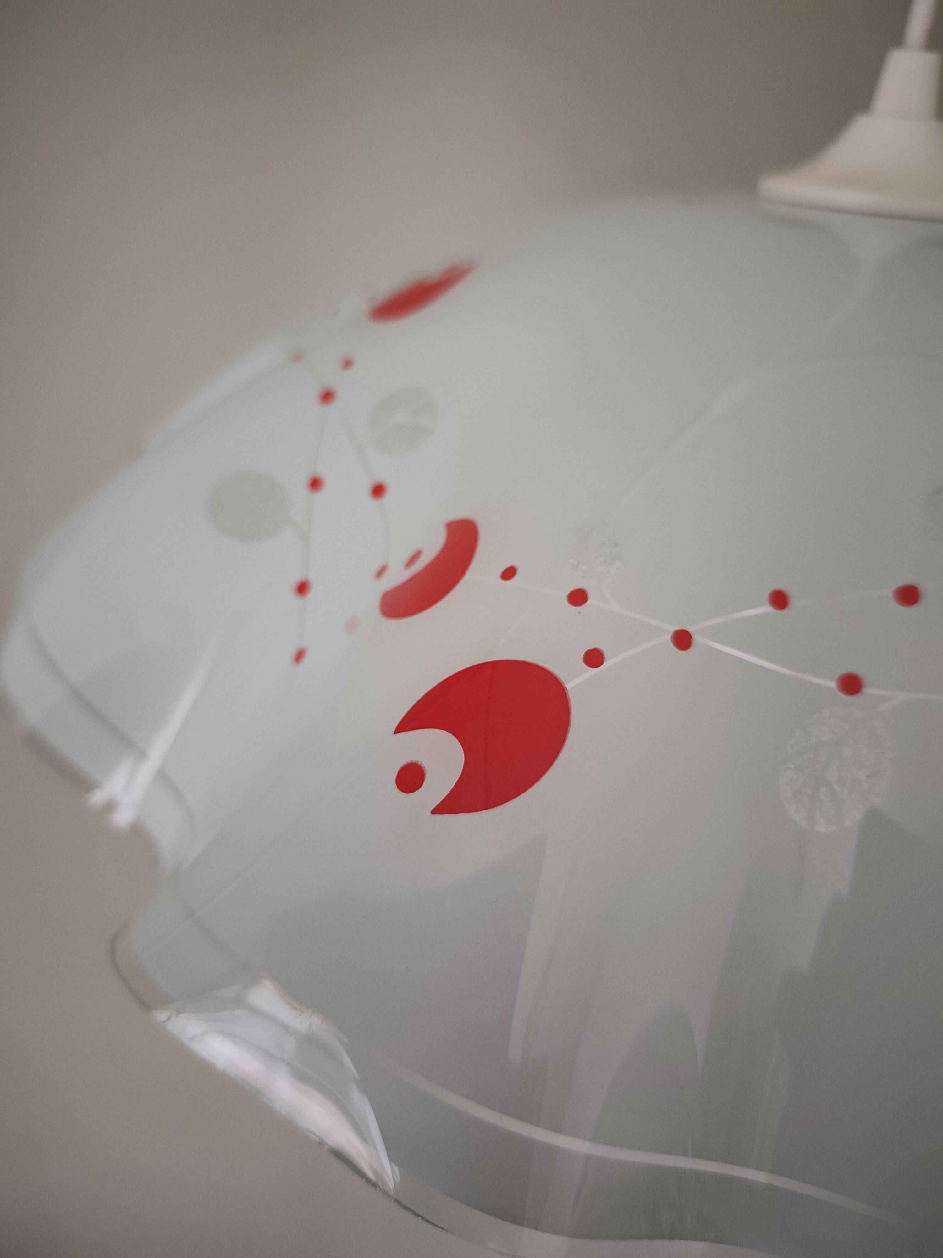 White opaline glass suspension with red and silver floral decoration.