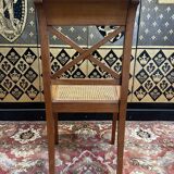 Suite de 9 chaises en cannage de style Empire - Consulat