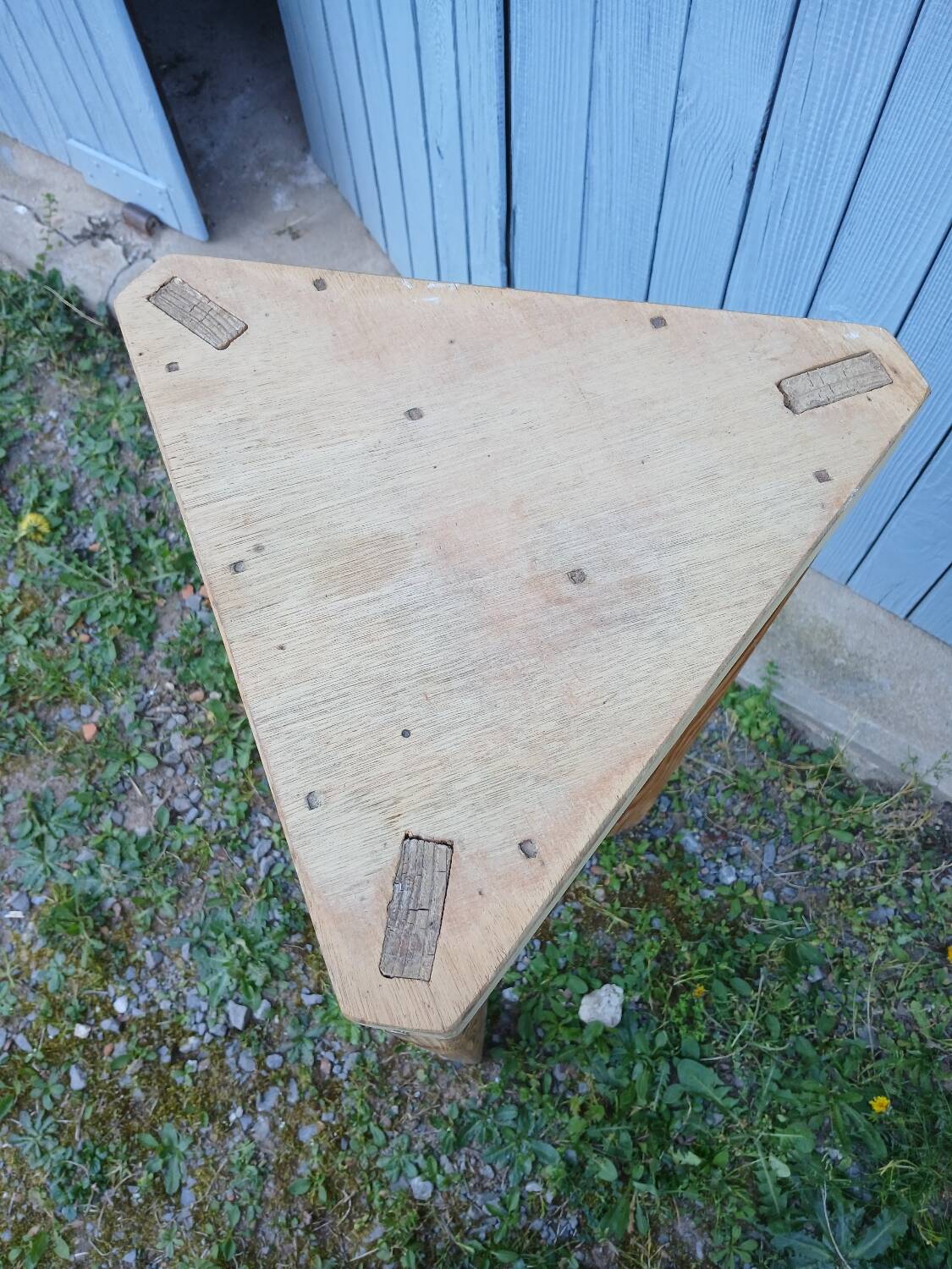 Antique saddle in raw wood and metal