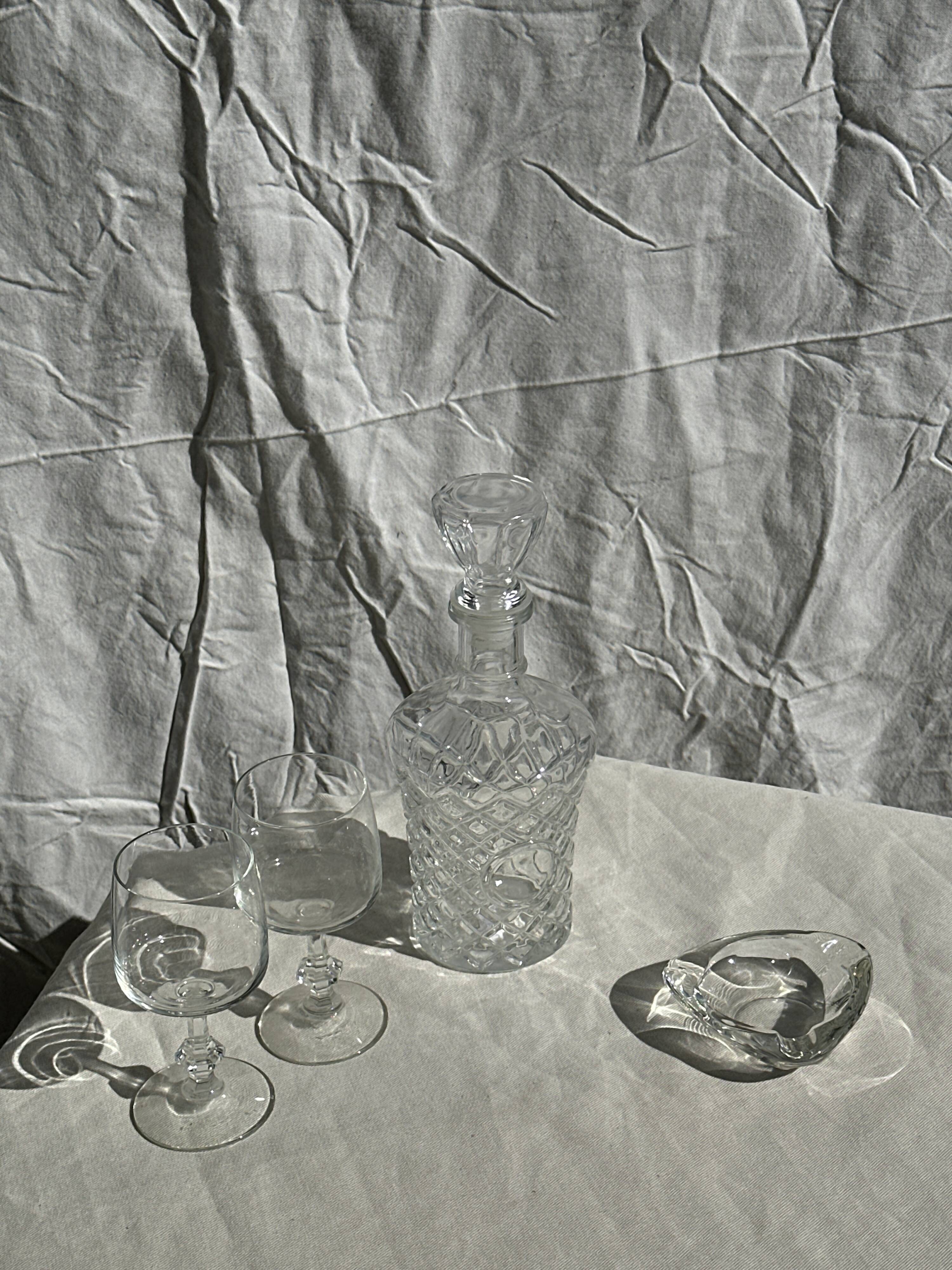 Small cylindrical glass whiskey decanter H:23