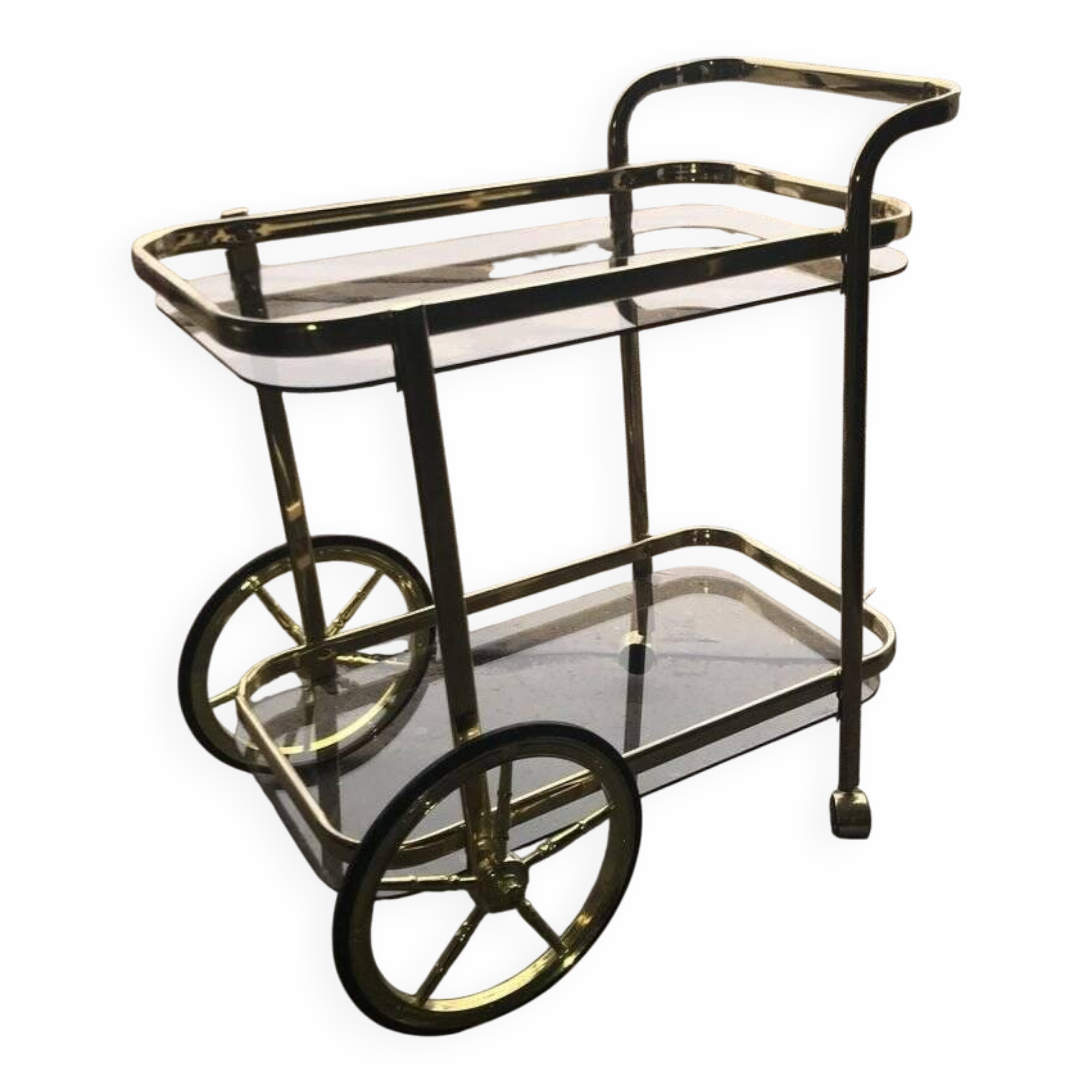 Two-tier bar cart in gold-plated brass with transparent glass shelves, yellow finish.