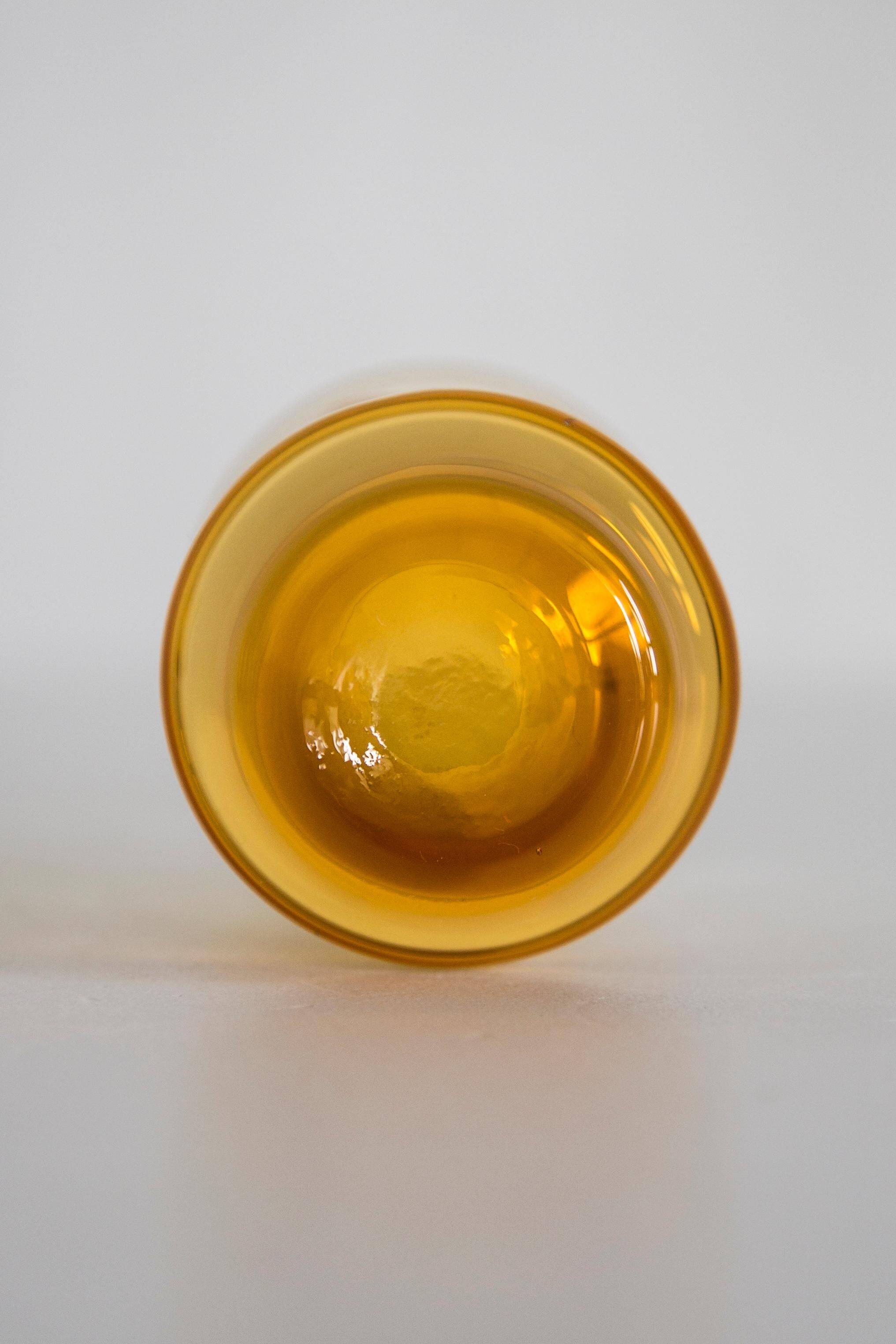 Set of six mid-century glasses and yellow Murano pot, Europe, 1960s.