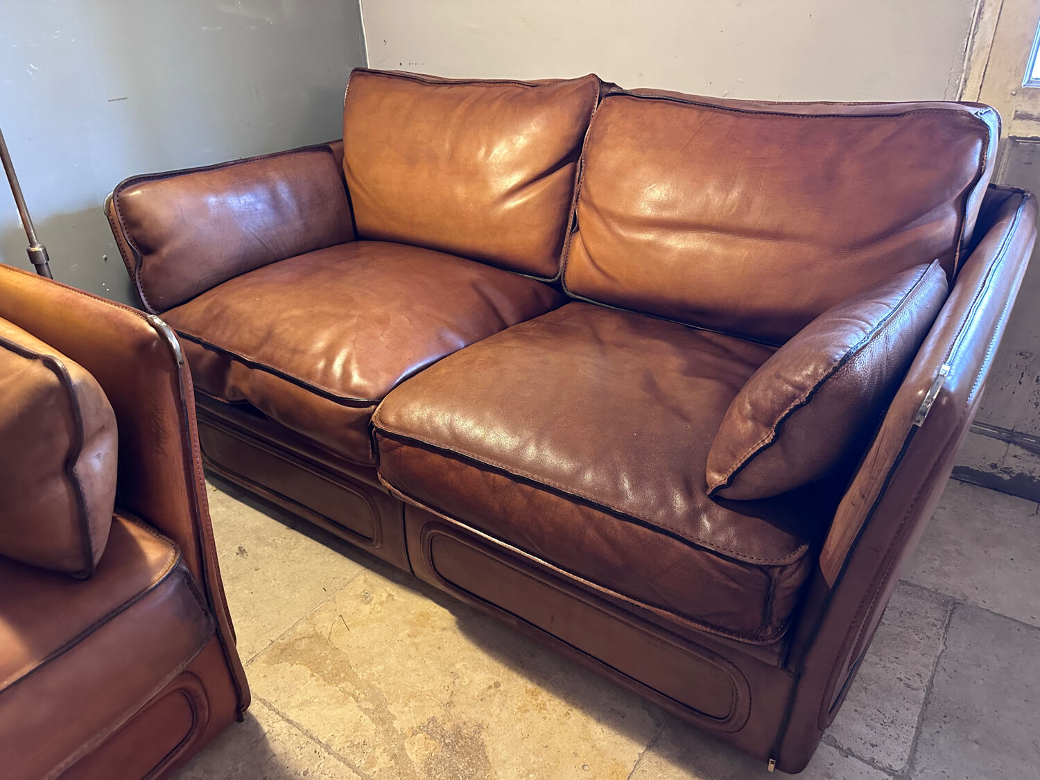 2-seater leather sofa by Roche Bobois