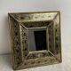 Eglomisé mirror with wooden parecloses
