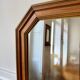 Miroir octogonal nervuré en bois doré