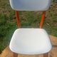 vintage wooden chairs with white faux leather