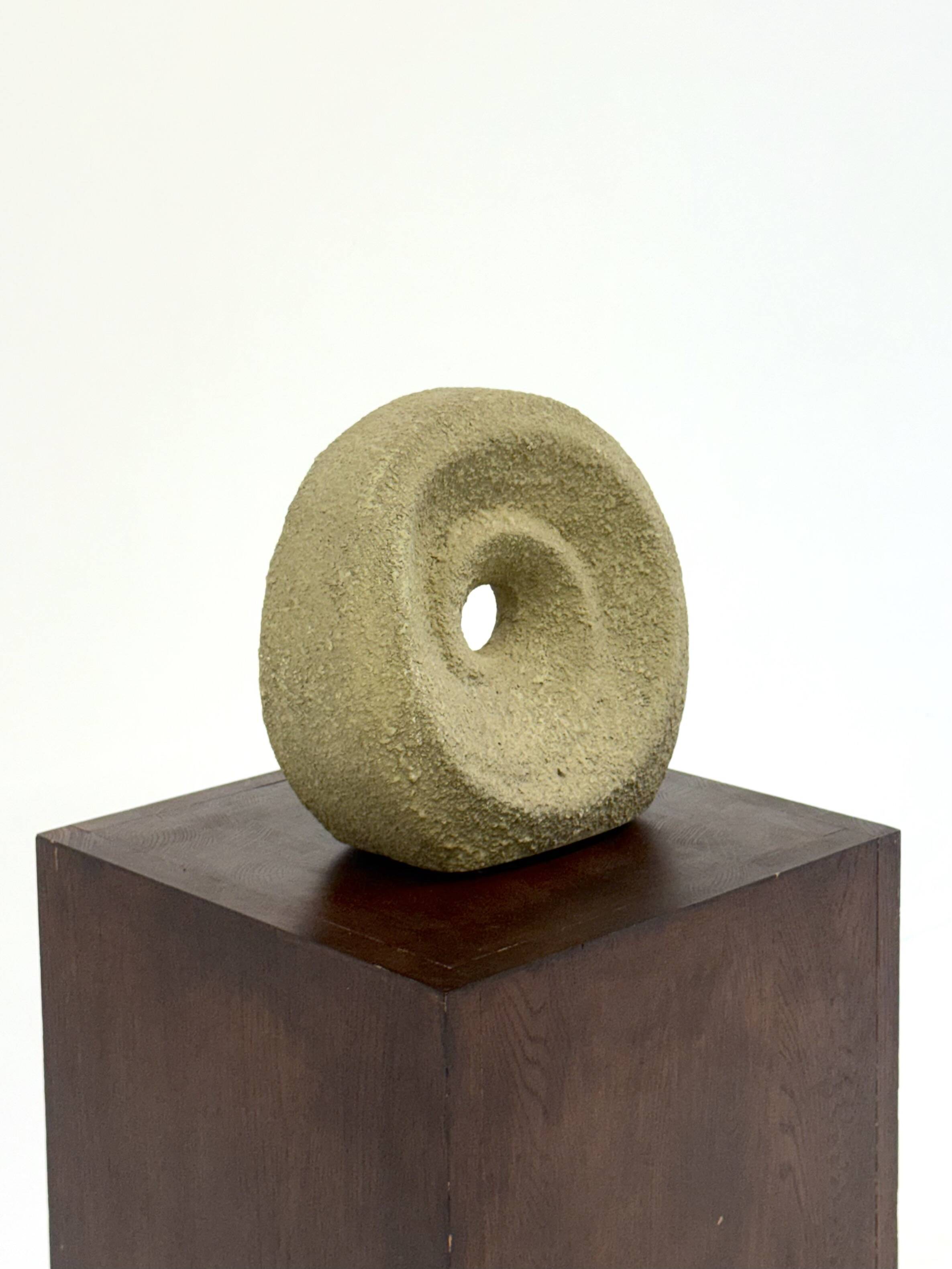 Unique round beige sculpture