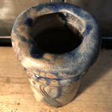 Enamelled pottery vase signed