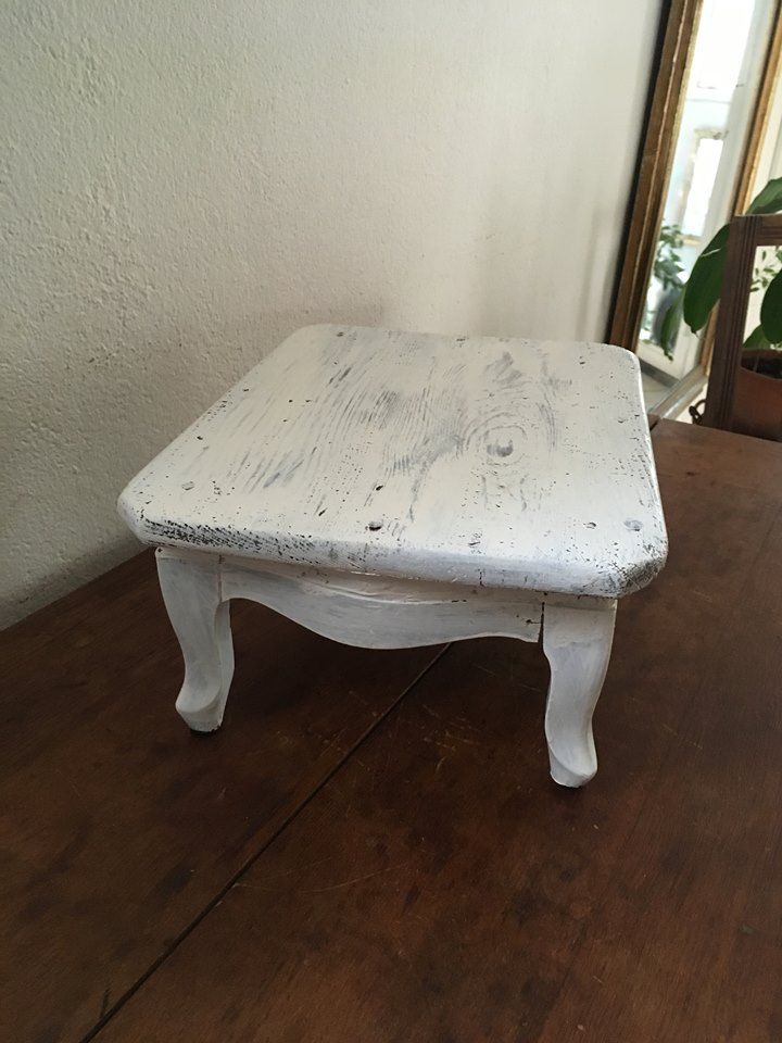 Former foot, skated in white wooden rest