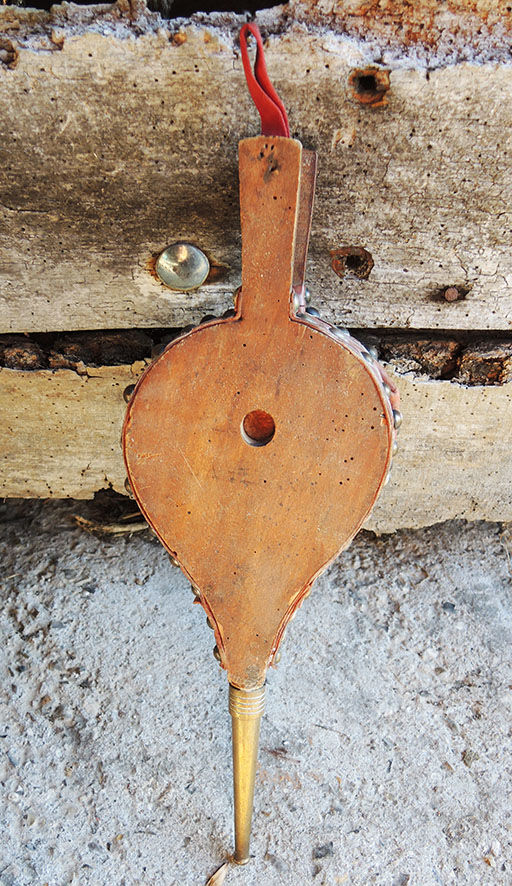Old bellows in wood & leather pattern concentric circles