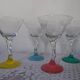 4 colored champagne glasses