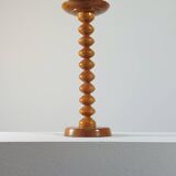 Vintage mid-century wooden candlestick, spool decoration from the 1970s.