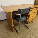 Old wooden desk and armchair
