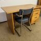 Old wooden desk and armchair