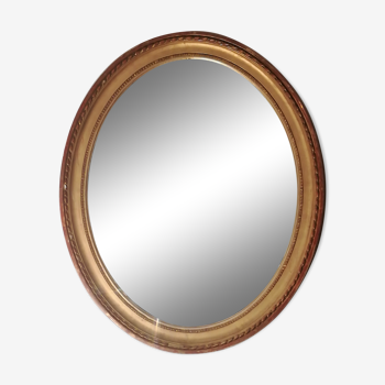 Miroir ovale style Louis XVI en bois doré 38cm