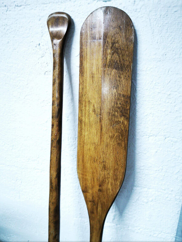 Pair of old wooden oars