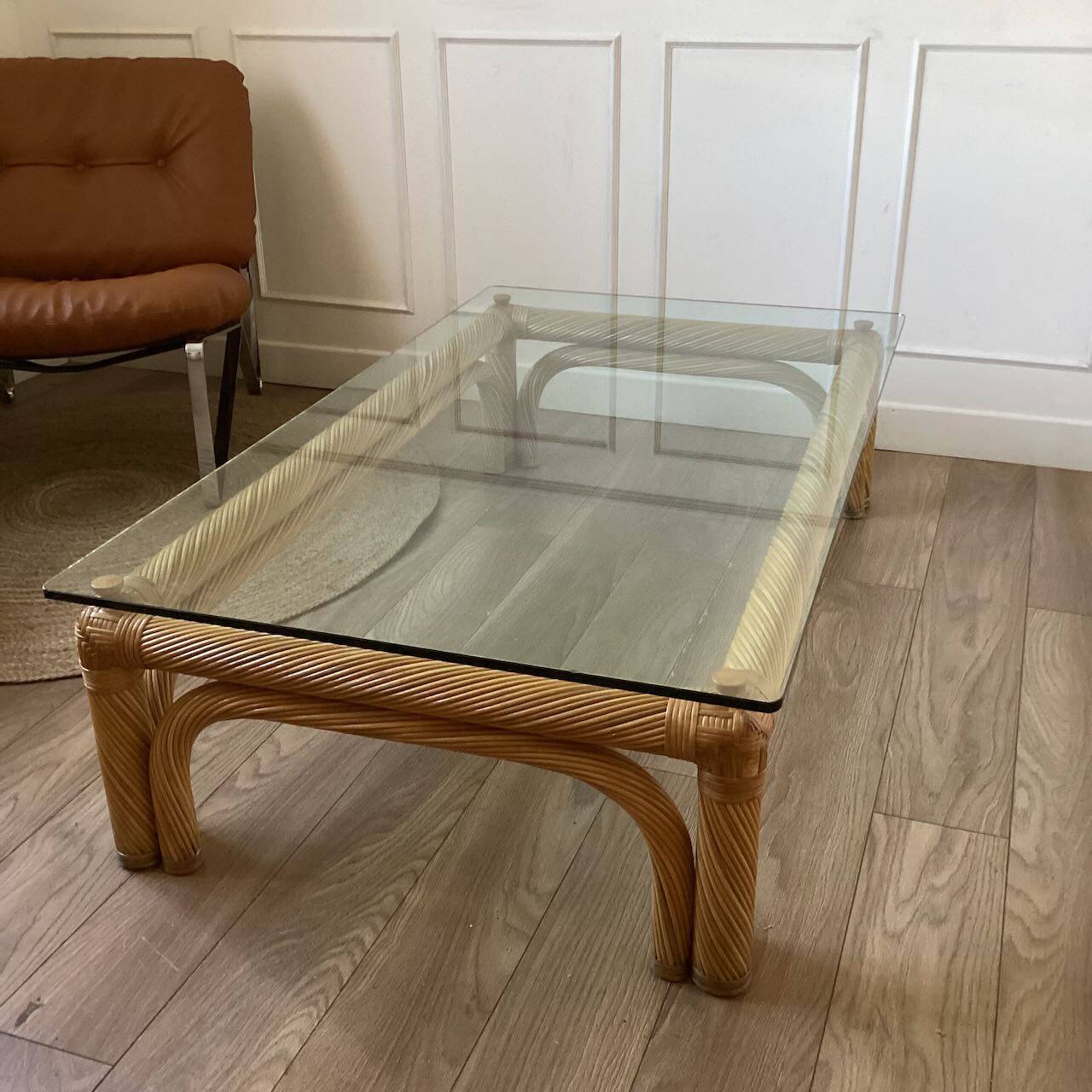 Large rattan and glass coffee table