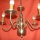 five-armed chandelier in white metal