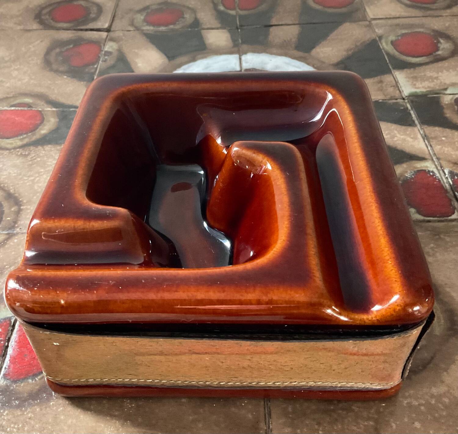 Vintage ceramic and leather ashtray
