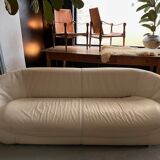Rounded off-white leather sofa