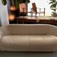 Rounded off-white leather sofa