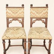 Pair of dining chairs, pair of carved Gothic chairs, set of Renaissance chairs.