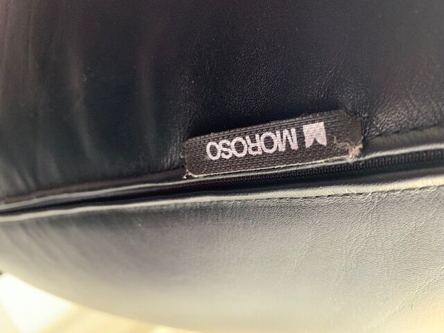 Moroso Fjord armchair with its pouf, design Patricia Urquiola 2002, steel and smooth black leather