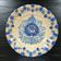 Old dish with blue floral decoration