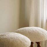 Modern Danish, a pair of tripod stools, seats reupholstered in lambswool, 1950s.