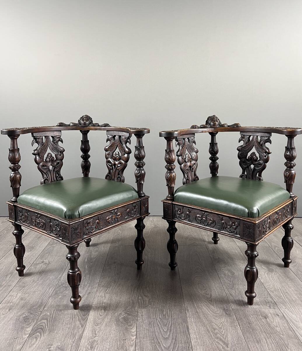 Pair of corner armchairs in carved wood, 19th century