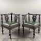 Pair of corner armchairs in carved wood, 19th century