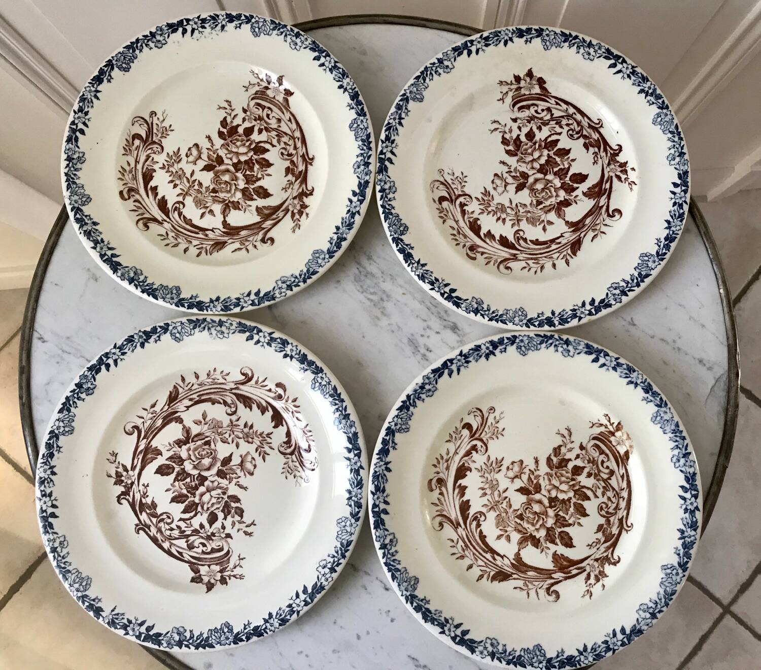 Set of 4 flat plates in Terre de Fer, Rocaille model, 19th century