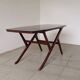 1950s Ilse Möbel coffee table with a black glass top.